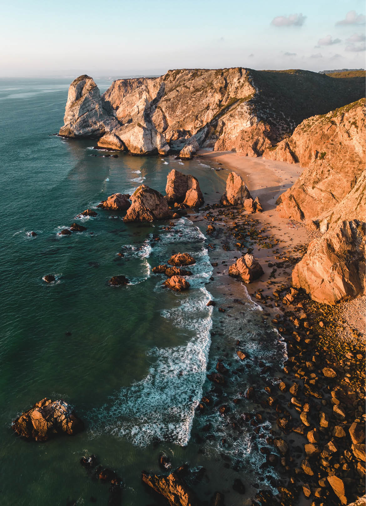 Sunset Aerial View Of Ursa Beach, Near Cabo Da Roca Bordering On Atlantic Ocean In Portugal